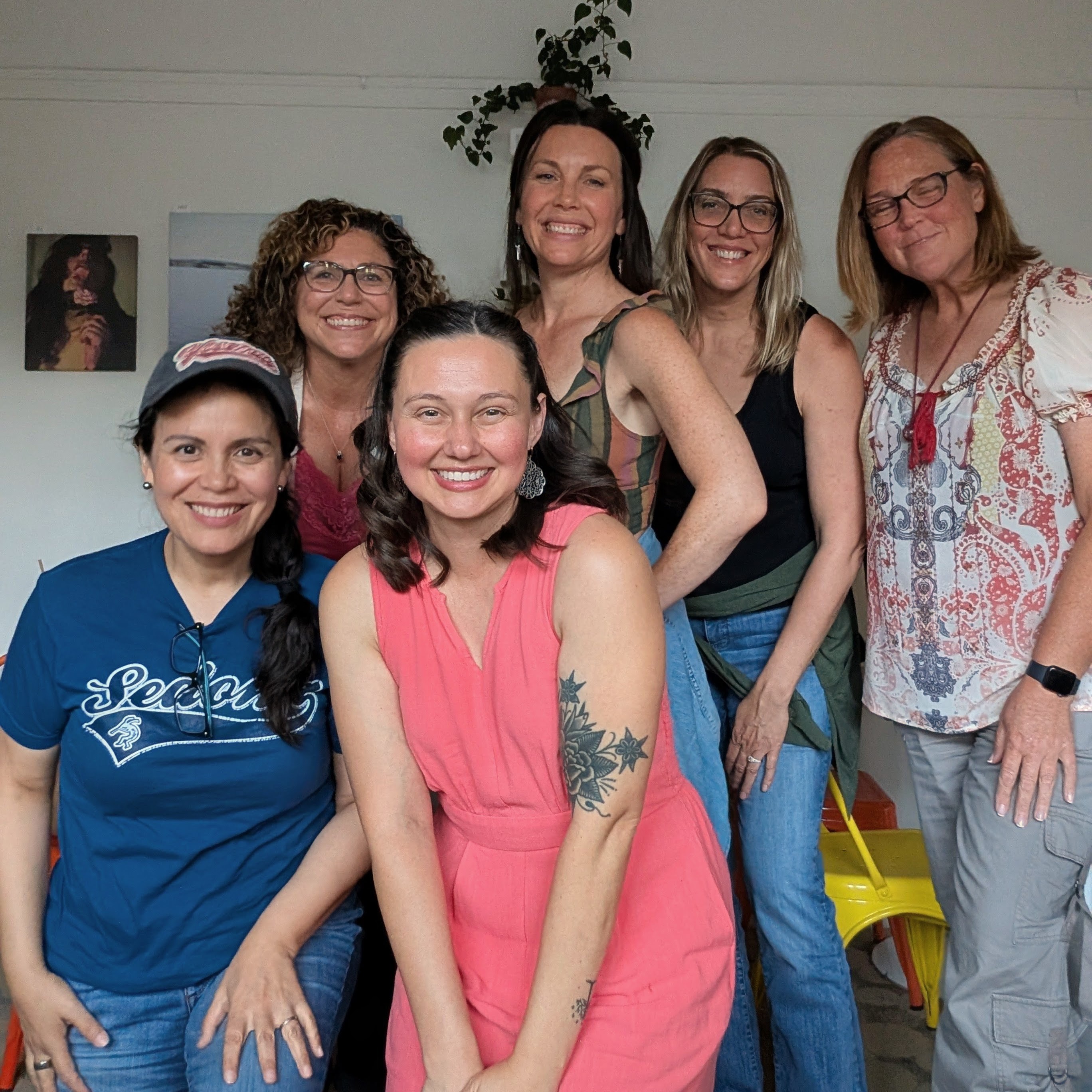Members of the Willow Collective smiling together at an in-person co-working meetup