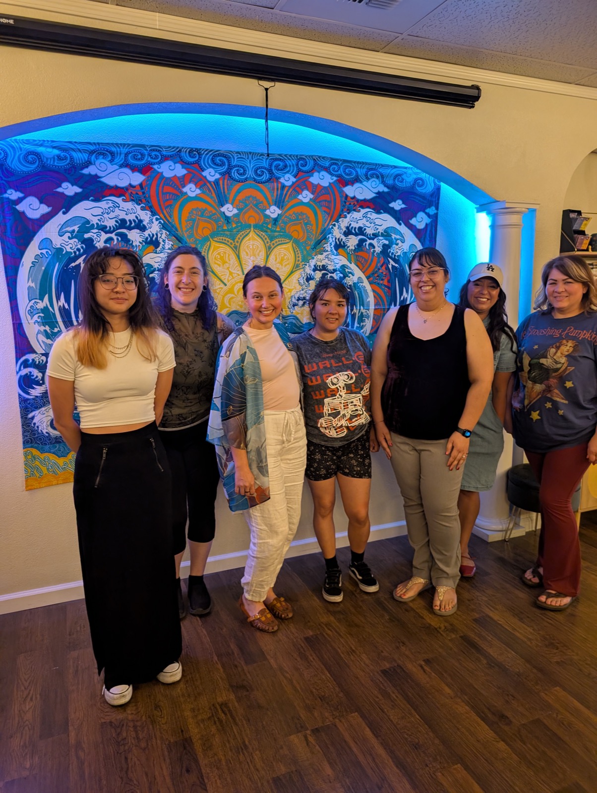 A group of Ladies That Launch members smiling together at a community meetup